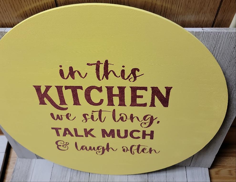 In this kitchen we sit long, talk much & laugh often