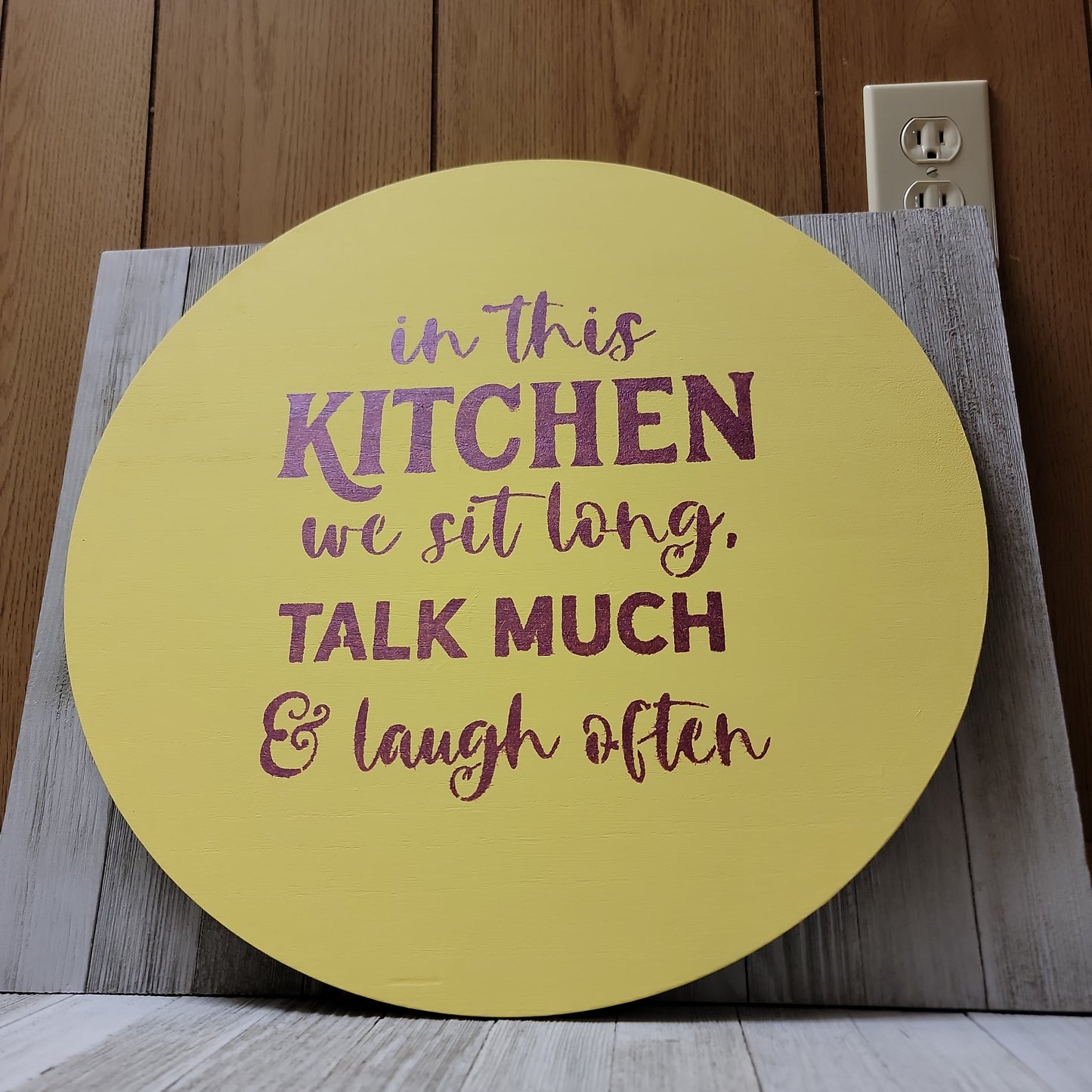 In this kitchen we sit long, talk much & laugh often