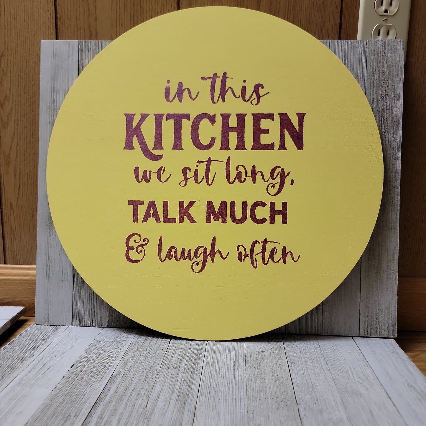 In this kitchen we sit long, talk much & laugh often