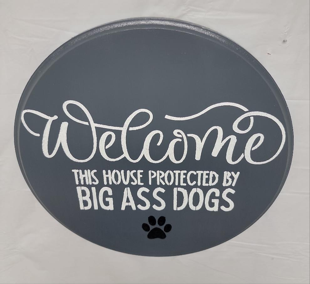 Welcome This house protected by BIG A** DOGS