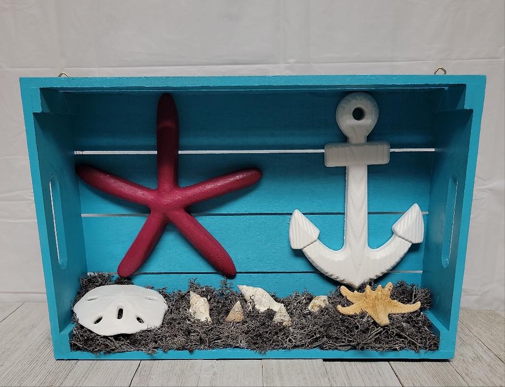 A beach themed shadowbox