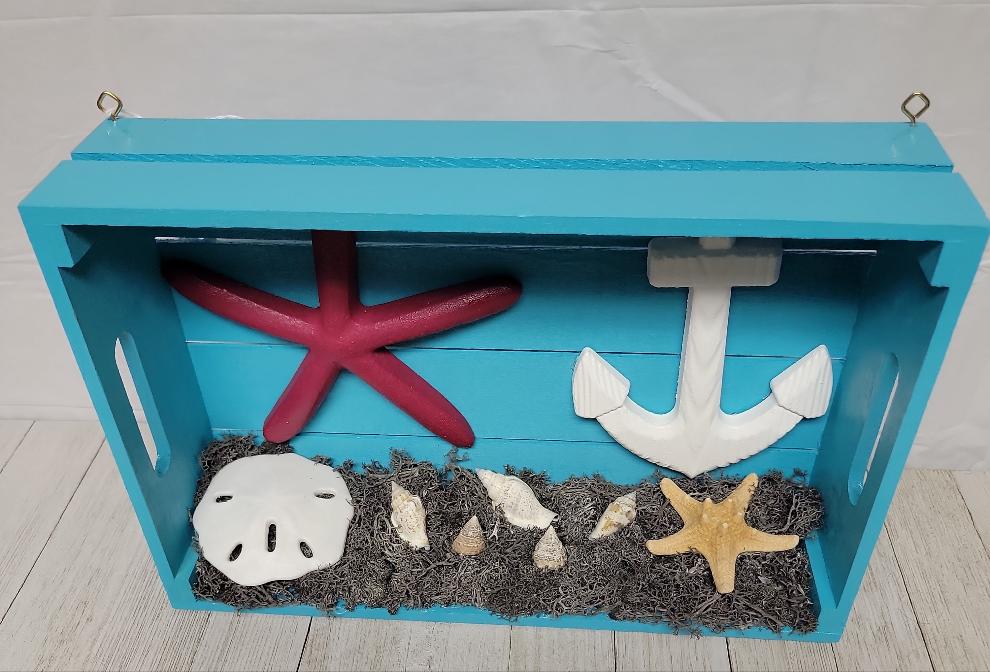 A beach themed shadowbox