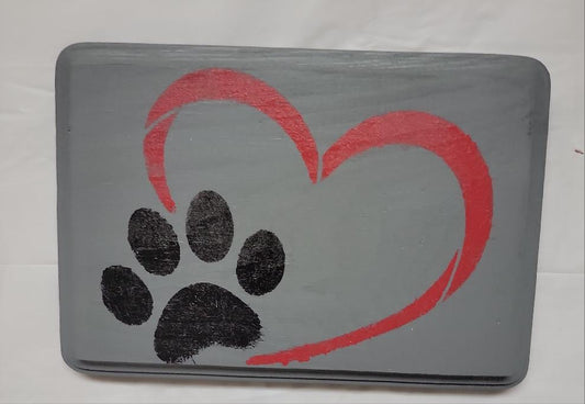 Pawprint with heart around it