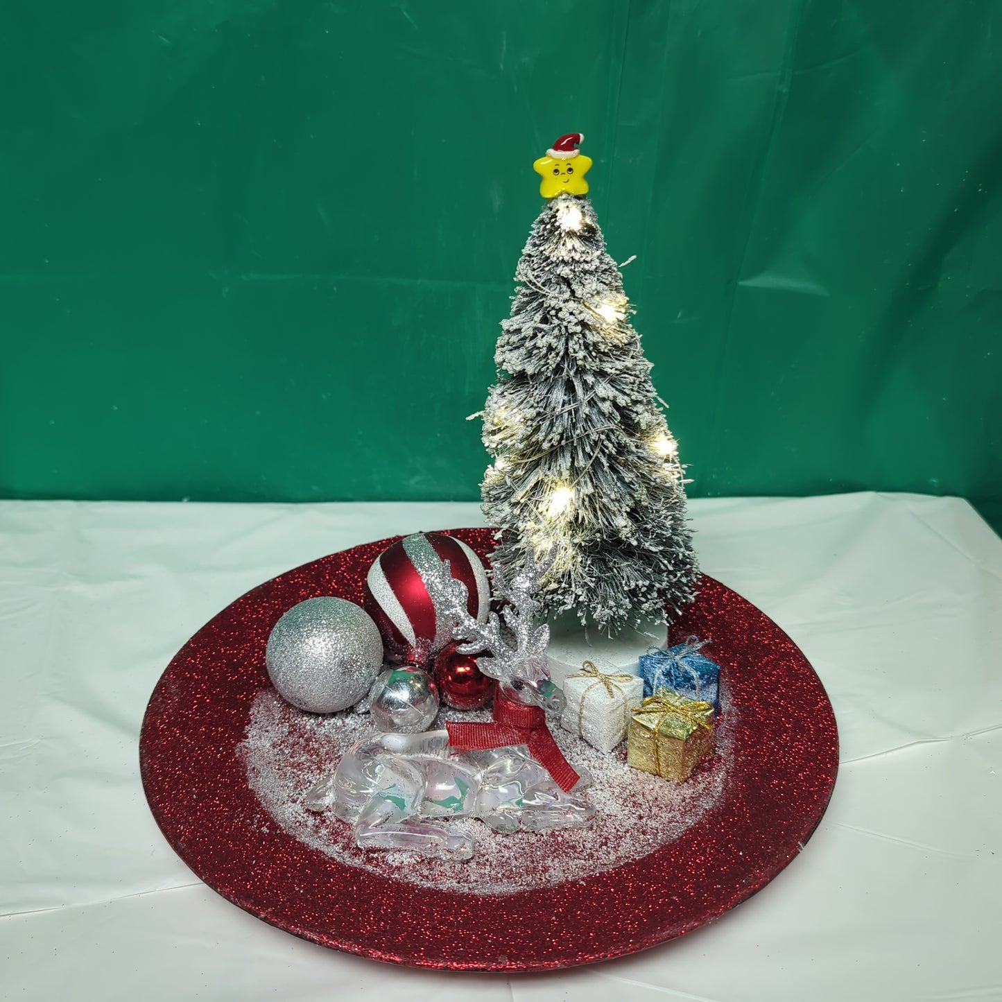 A Red plate Deer and Tree Arrangement