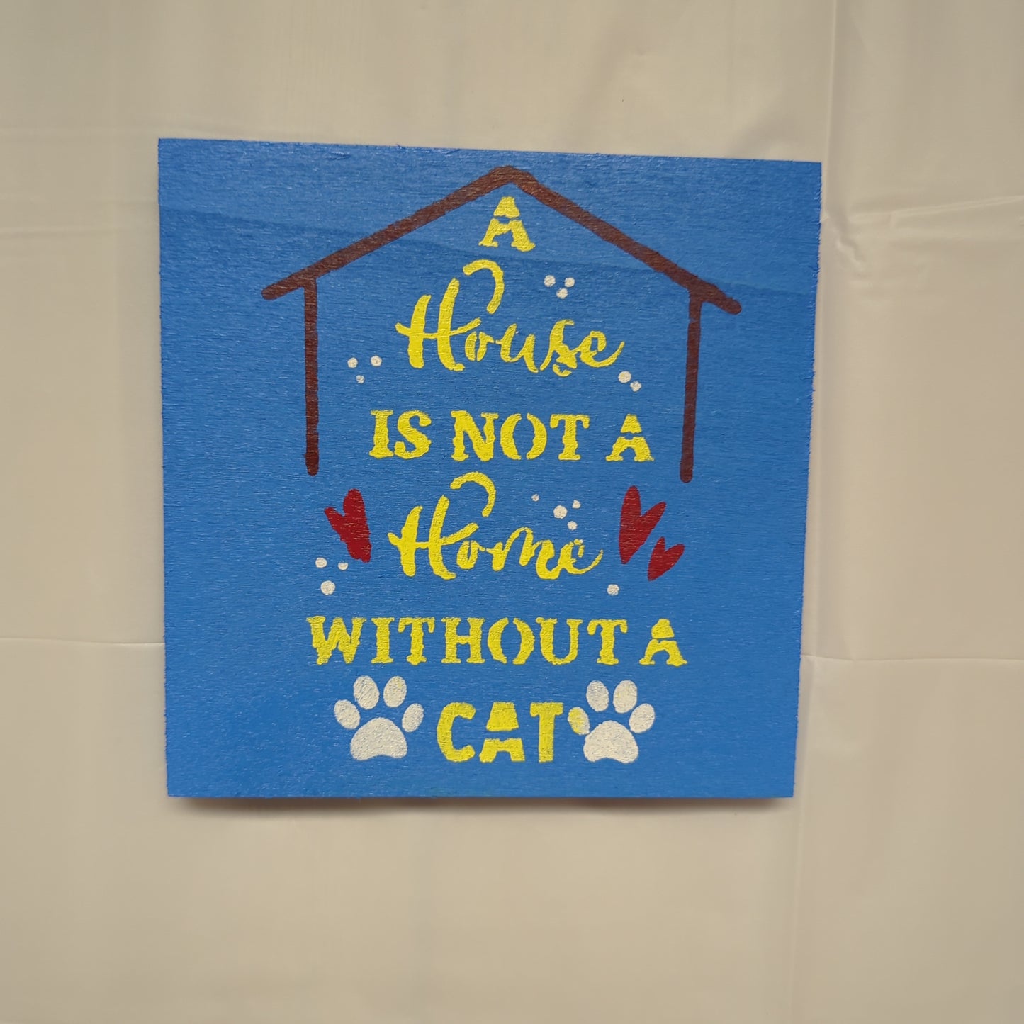 Without a Cat Wood sign