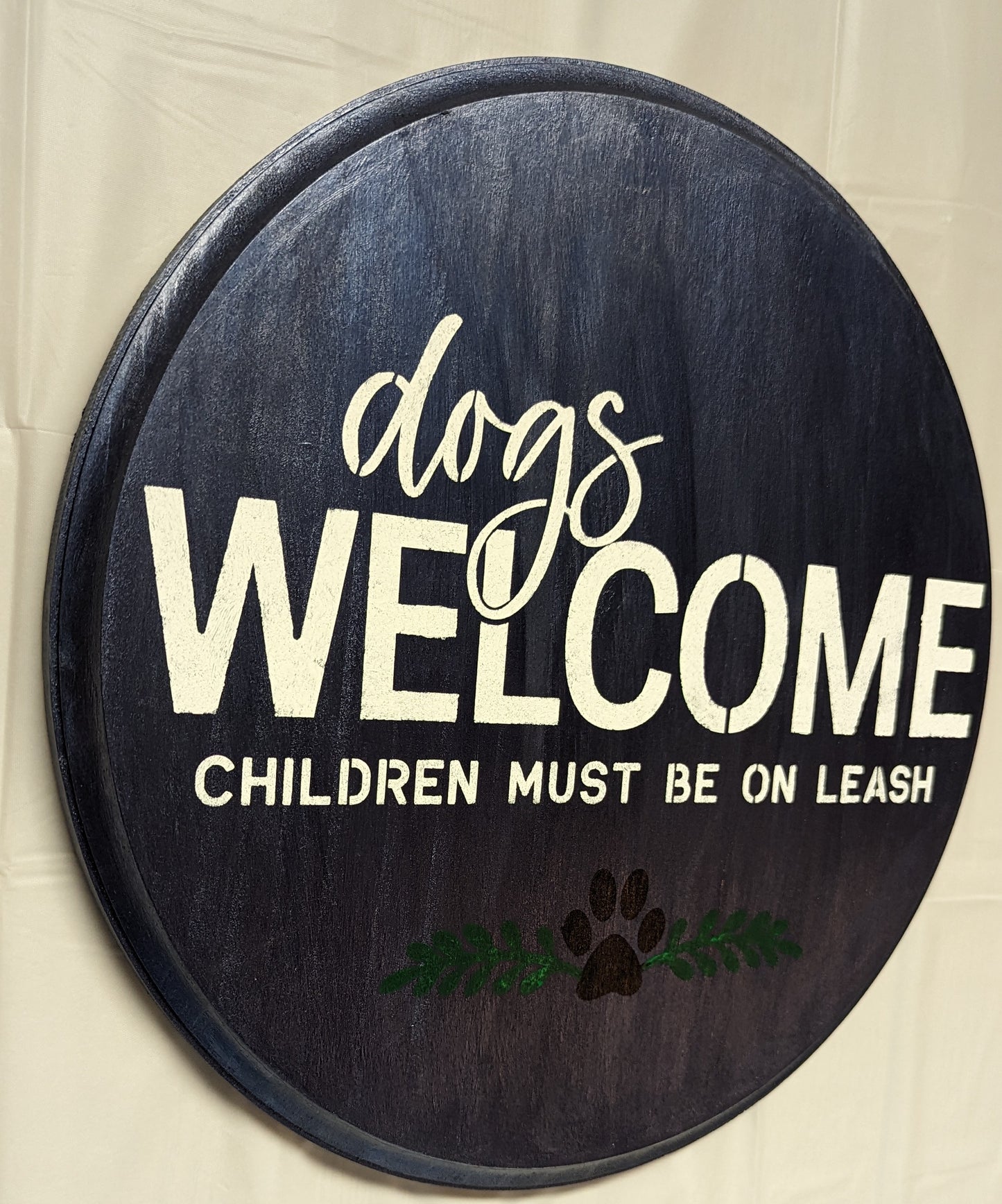 Dogs in Welcome wood sign